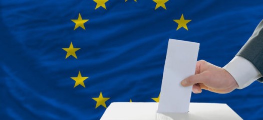 man voting on elections in europe in front of flag